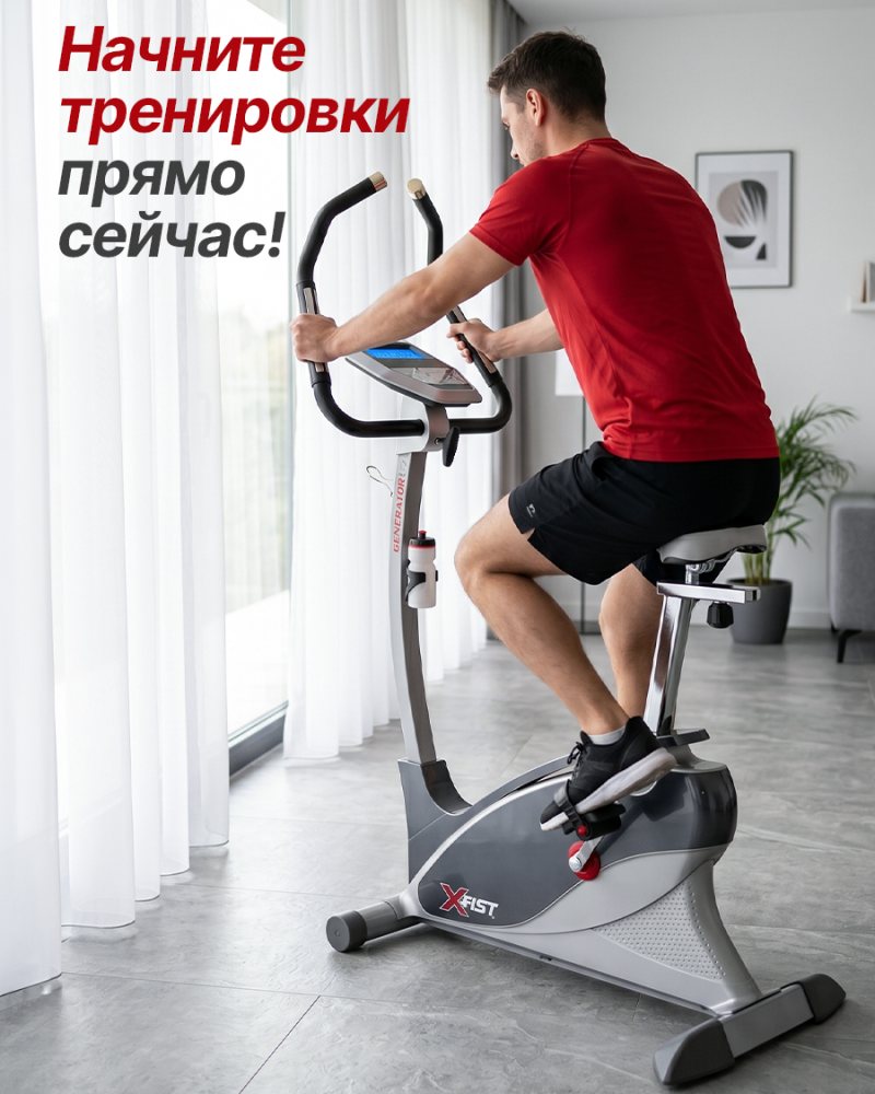 Мужчина тренируется на велотренажёре с генератором